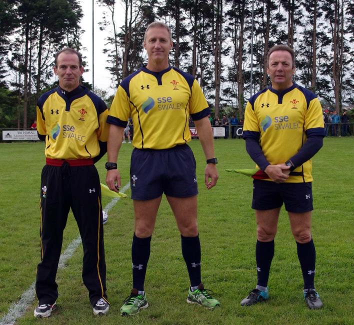 Match officials Adrian Slade, Chris Oliver and Colin Phillips